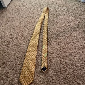 Vintage yellow tie with blue and green pattern